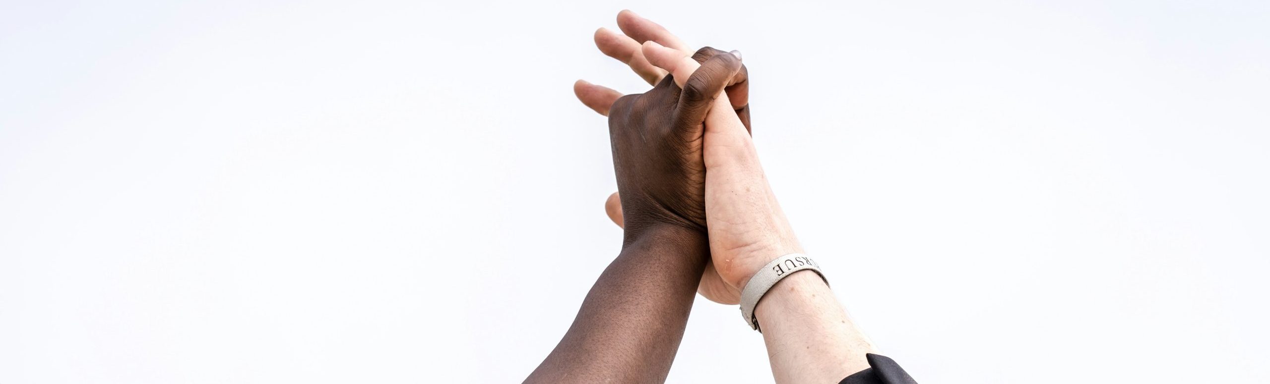 two people holding hands